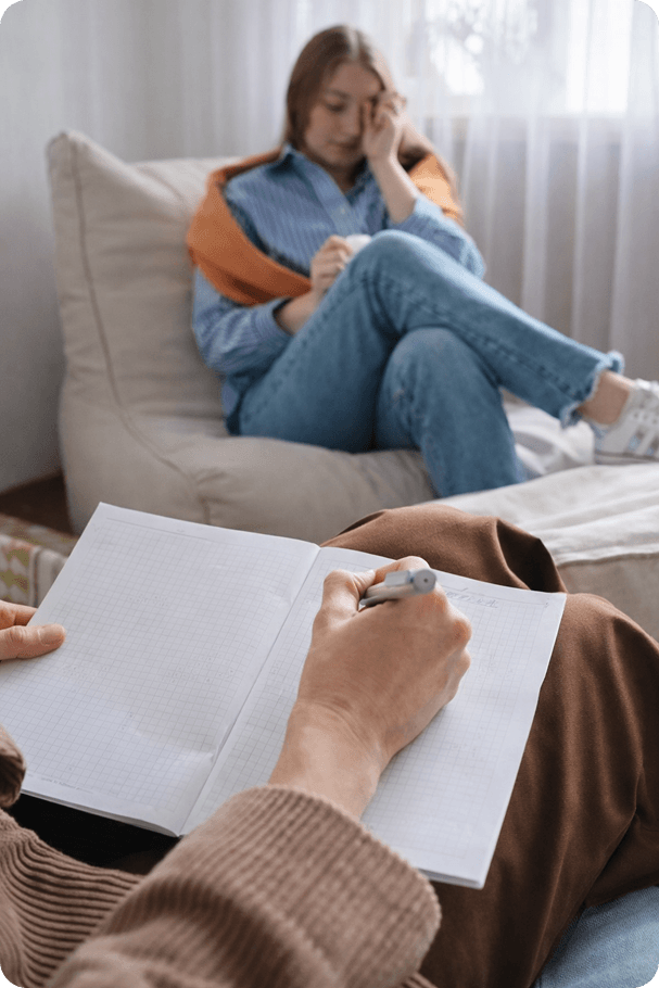 Adult woman in a counseling session speaking with a therapist, representing support for anxiety, stress, and emotional wellbeing